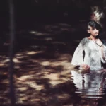 Fotografo fashion Imperia - modella in abito bianco nel bosco