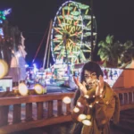 Fotografo creativo Liguria - Yuriko luci fatate ruota panoramica luna park notte
