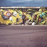 Fotografo street Imperia - modella grande murale graffiti street art figura intera